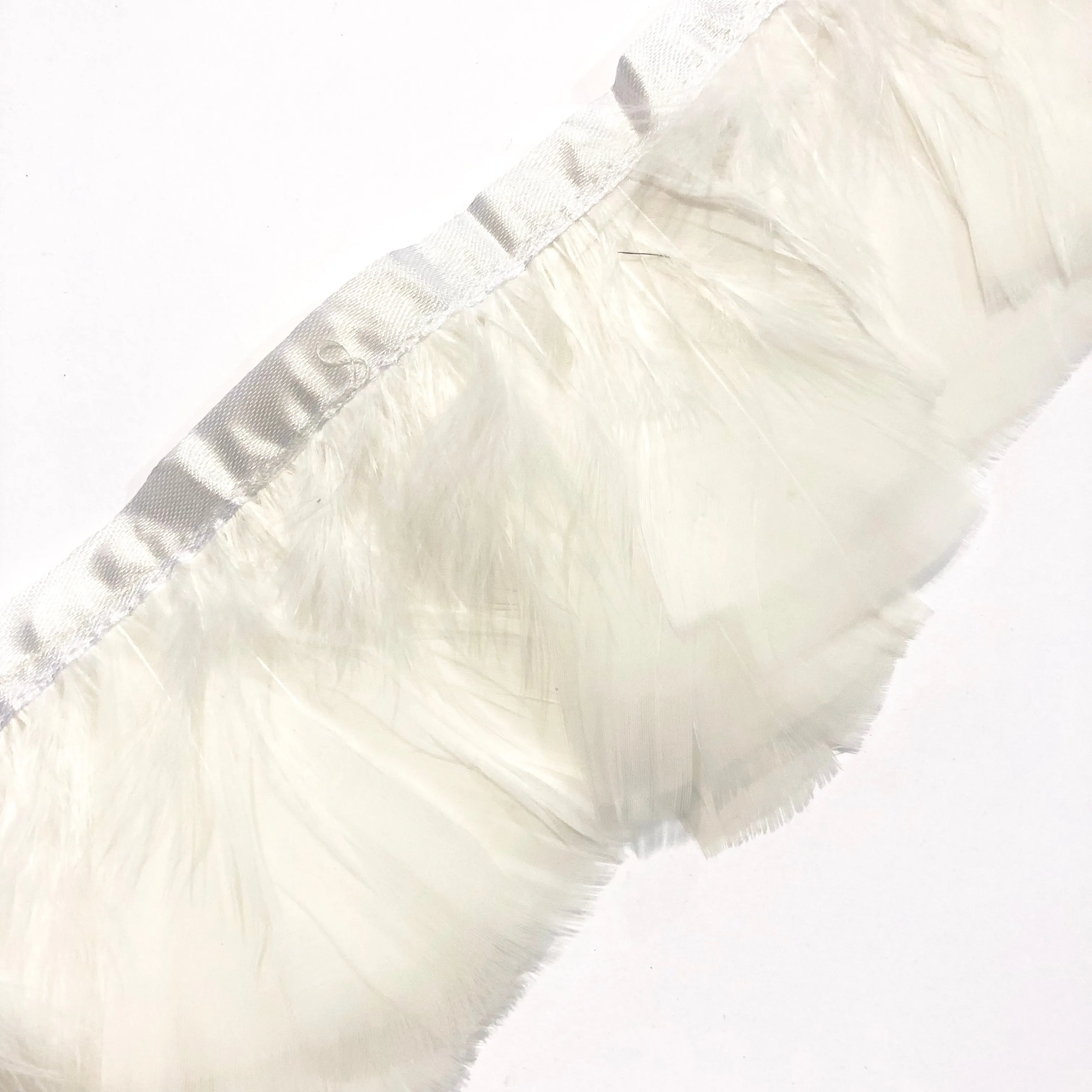 Turkey Plumage Feather Ribbon Strung per metre - White